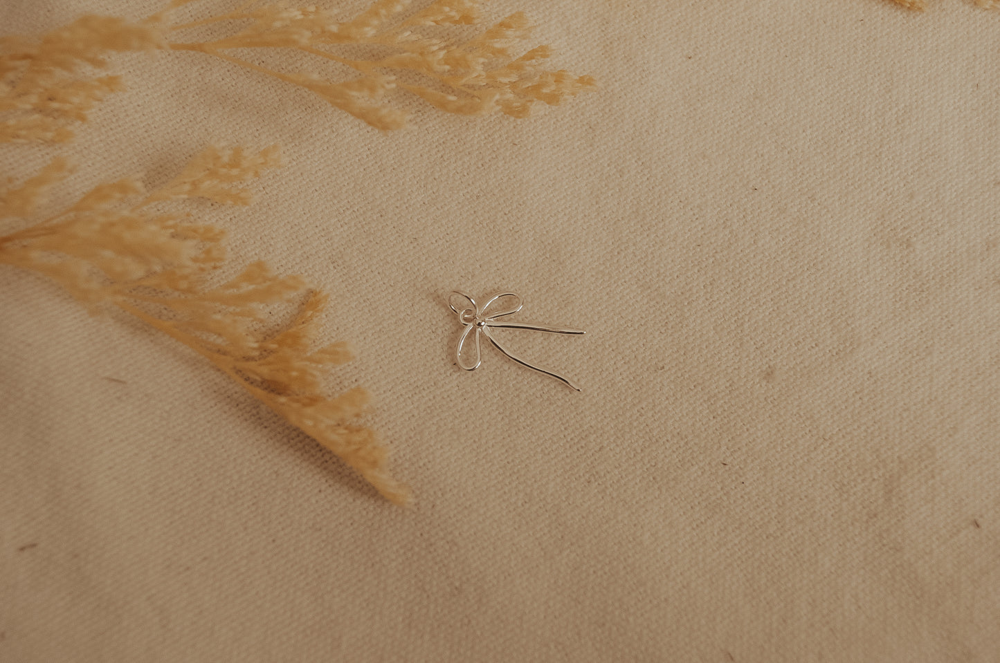 The Sterling Silver Bow Charm