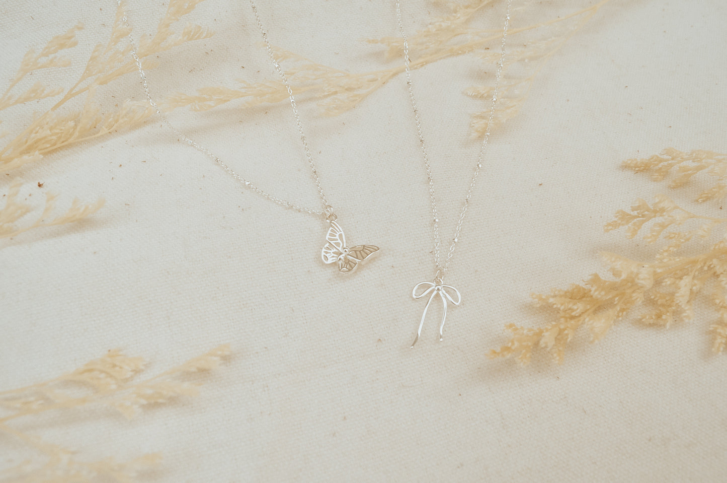 The Bow & Butterfly Necklaces